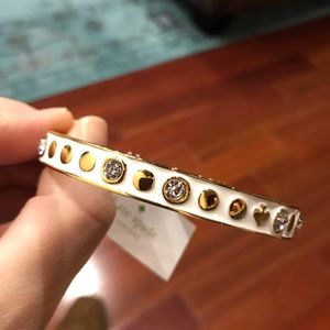 White and gold Kate Spade Bracelet